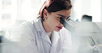 Particles, scientist and woman with microscope, healthcare and medical research for breakthrough with tech. Lab, analysis and person with equipment for science, examination and diagnosis of diseases