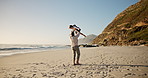 Dad, running and spin girl at beach, playful and care with bonding, vacation and outdoor in summer. People, father and lift child with games, excited and love on family holiday by ocean in Australia