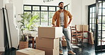 Man, relocation and moving boxes in home, happy and property investment or real estate mortgage. Carrying, cardboard package and owner of new house, purchase and proud of residential achievement