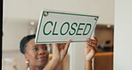 Woman, cafe and closed sign on door, small business and storefront or end of service message. Display, black person and information to customer on poster, coffee shop and notice for hospitality