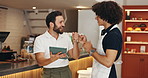 Employees, barista and tablet for restaurant management, fist pump and motivate for hospitality service. Online, people and business workers in coffee shop, support team and chat on menu inventory