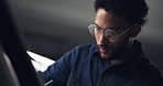 Drawing, glasses and man in studio at night for project with deadline for startup business visual communication. Sketching, creative and male graphic designer sketching art for prototype in office.