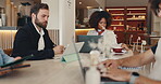 Colleagues, cafe and group with laptop, team and planning for project with tech, sales manager or research. Corporate, employees and online for collaboration in restaurant, serious or people with web