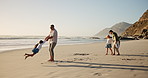 Dad, family and spin girl at beach, playful and care with bonding, vacation and walk with mom in summer. People, parents and children with games, excited and love on holiday by ocean in Australia