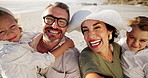 Parents, selfie and kids at beach with face, smile and excited for vacation, adventure and love in summer. People, mom and dad with children, family and photography for social media by sea in Spain