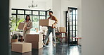 New home, happy and couple with boxes for moving, property and investment in new house. Homeowner, real estate and man and woman with packages for mortgage, purchase and rental apartment together