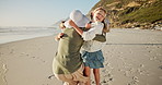 Children, run and hug mother at beach with dad, excited or bonding with love on vacation in summer. People, parents and kids on holiday, family and playful with embrace, care or smile by sea in Italy