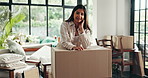 Face, moving and woman with boxes, smile and proud of investment with new home, mortgage and lounge. Happy, owner and person with cardboard in house, real estate and loan for property or confident