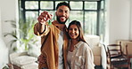 New home, happy and couple with keys excited for property, moving day and investment. Homeowner, real estate and man and woman hug with keychain for mortgage, purchase house and rental apartment