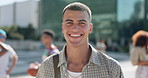 Man, student and smile on face, campus and outdoor for education, development and excited in city. Person, portrait and smile for learning at college, university and happy with bag for studying
