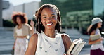 Happy girl, face and student with book in city for academic growth, learning journey or knowledge. Portrait, female person or gen z with smile for education, scholarship or development in urban town