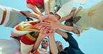 Happy people, hands together and huddle with applause for motivation below for unity, teamwork or mission. Low angle, group or circle with piling or stack in solidarity for community development