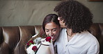 Love, kiss and couple hug with flowers for valentines day celebration, romance and connection with partner. Man, woman and embrace with bouquet for present, smile or date on anniversary in restaurant