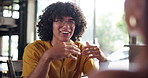Smile, conversation and couple in cafe, bonding and laughing on date, romance and happy in relationship. Talking, woman and man with joke in coffee shop, love and people with joy for commitment