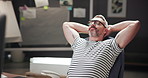 Business, relax and man in office, completed task and assignment finished with confidence. Person, entrepreneur and graphic designer in workspace, resting and career ambition with hands on head