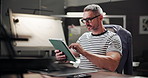 Business, tablet and man in office, thinking and decision with internet, design editing and network. Person, employee and tech in workplace, illustrator and typing with digital app for project