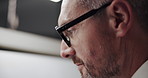 Business, drawing and man with glasses, engineering and illustration for project management. Employee, night and professional in workspace, eyewear and deadline with building design and architecture