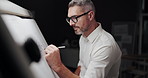 Business, drawing and night with man, illustration and architecture with problem solving. Evening, person and employee with ideas, creativity and deadline with engineering and construction planning