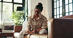 Thinking, happy and woman on sofa with diary for writing ideas, inspiration and brainstorming. Living room, journal and person with notebook for mindfulness, thoughtful and creative planning in home