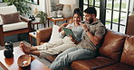 Couple, tablet and talk on sofa in home, relax and embrace with planning vacation in living room. Man, woman and digital touchscreen with app, happy and search for holiday location at apartment