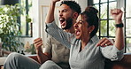Excited, watching TV and couple celebrate on sofa for sports, game and score on streaming subscription. Love, dating and man with woman on couch for entertainment, bonding and cheering for goals