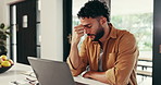 Man, freelancer and headache with laptop, stress and burnout or brain fog in kitchen. Remote work, glasses and eye strain with pain, frustrated and challenge at computer in home for web 404 error