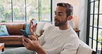 Home, man and credit card with smartphone for payment, banking app and online shopping on sofa. House, couch and male person with mobile for debit details, ecommerce and subscription for platform
