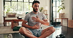 Breathing, balance and yoga with man in living room for mindfulness or inner peace in home. Fitness, meditation and wellness with calm person in apartment for awareness or mental health exercise