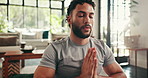 Home, man and meditation with prayer hands for fitness, mindfulness and inner peace with zen in apartment. House, male person and yogi with namaste for holistic wellness, breathing or yoga in morning