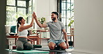 Yoga, high five and couple in home for exercise, workout and stretching for wellness, support and balance. Happy, love and man with woman celebrate for pilates, health goals and bonding in house