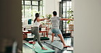 Yoga, stretching and couple on mat in home for exercise, workout and warm up for wellness, health and balance. Morning, apartment and man with woman in warrior pose for pilates, flexibility and calm