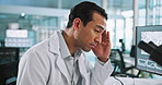 Lab, headache and man on computer for research, medical study and microscope for sample. Healthcare, pharmaceutical and tired scientist with fatigue, burnout and stress for mistake with vaccine