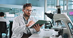 Tablet, research and scientist in laboratory for DNA innovation, project or discovery. Science, digital technology and male biologist with RNA for pharmaceutical innovation with medical analysis.