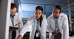 Scientist, meeting and teamwork with technology in lab for pharmaceutical review, medical research or tablet. Night, people and interactive display for studying science, collaboration and results