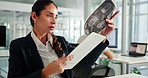 Woman, notes or MRI in office for science, research or neurotechnology study at tech. Mature engineer, clipboard or reading in firm for healthcare innovation, thinking or developing AI brain system