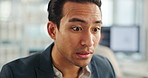 Business, thinking and Asian man in office, shocked and answer with email notification. Person, professional and employee in workplace, decision and choice with opportunity, thoughtful and surprise