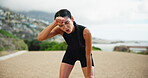 Break, runner and woman with fatigue, outdoor and exhausted by exercise in morning, active and running. Tired, athlete and person with sweat on race, breathing and workout for marathon or wellness