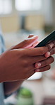 Typing, phone and hands of business woman for networking, social media and internet for emails. Professional, corporate and worker on smartphone for connection, contact and online communication 