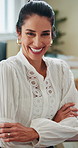 Face, business and woman in office, arms crossed and smile with corporate professional, accounting and pride. Portrait, mature person and financial advisor with happiness, career ambition and growth