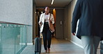 Suitcase, walk and woman travel for business, conference and industry workshop. Convention center, journey and entrepreneur person in hotel lobby for job seminar, corporate pride and career trip