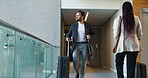 Suitcase, walk and happy man travel for business, conference and industry workshop. Convention center, journey and entrepreneur person in hotel lobby for job seminar, corporate pride and career trip