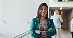 Arms crossed, face and smile of business woman in convention center for career or upskill development. Conference, confident and corporate with happy Asian employee at tradeshow for opportunity