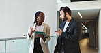 Tablet, walking and business people in office for planning, conversation or help with investment. Technology, team collaboration and discussion for financial news, economy or brainstorming solution