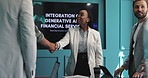 Handshake, meeting and business people in office, partnership and financial agreement. Group, employees and shaking hands in workplace, cooperation and planning for tech, thank you and collaboration