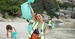 Face, beach and woman with trash bag, smile and recycle with earth day, cleaning and environment. Portrait, people and volunteer with plastic collection, eco friendly or seaside with climate change