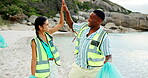 Face, high five and litter with friends on beach for cleaning, conservation or environmentalism. Activism, charity and recycling with happy people on coast for achievement, teamwork or success