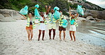 Excited. face and waste with friends on beach for cleaning, conservation or environmental activism. Celebration, charity and recycling with group of happy people on coast for teamwork or success