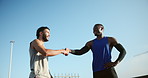 Running, men and athlete with watch, handshake and check time for exercise with fitness. Urban, friends and runner with break for workout, training and wellness for healthcare endurance challenge