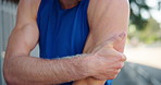 Fitness, hands and arm injury outdoor with joint ache, workout accident and massage muscle tension. Male athlete, exercise and strain with inflammation, painful and training mistake on sidewalk