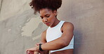 Outdoor, woman and sad with smart watch for fitness, check time and wellness for workout by wall. African female person, disappointed and mockup with clock for exercise steps, health stats or results